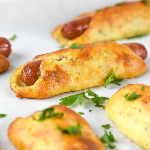 sweetketolife.com-fathead-pigs-in-a-blanket-recipe-puffy